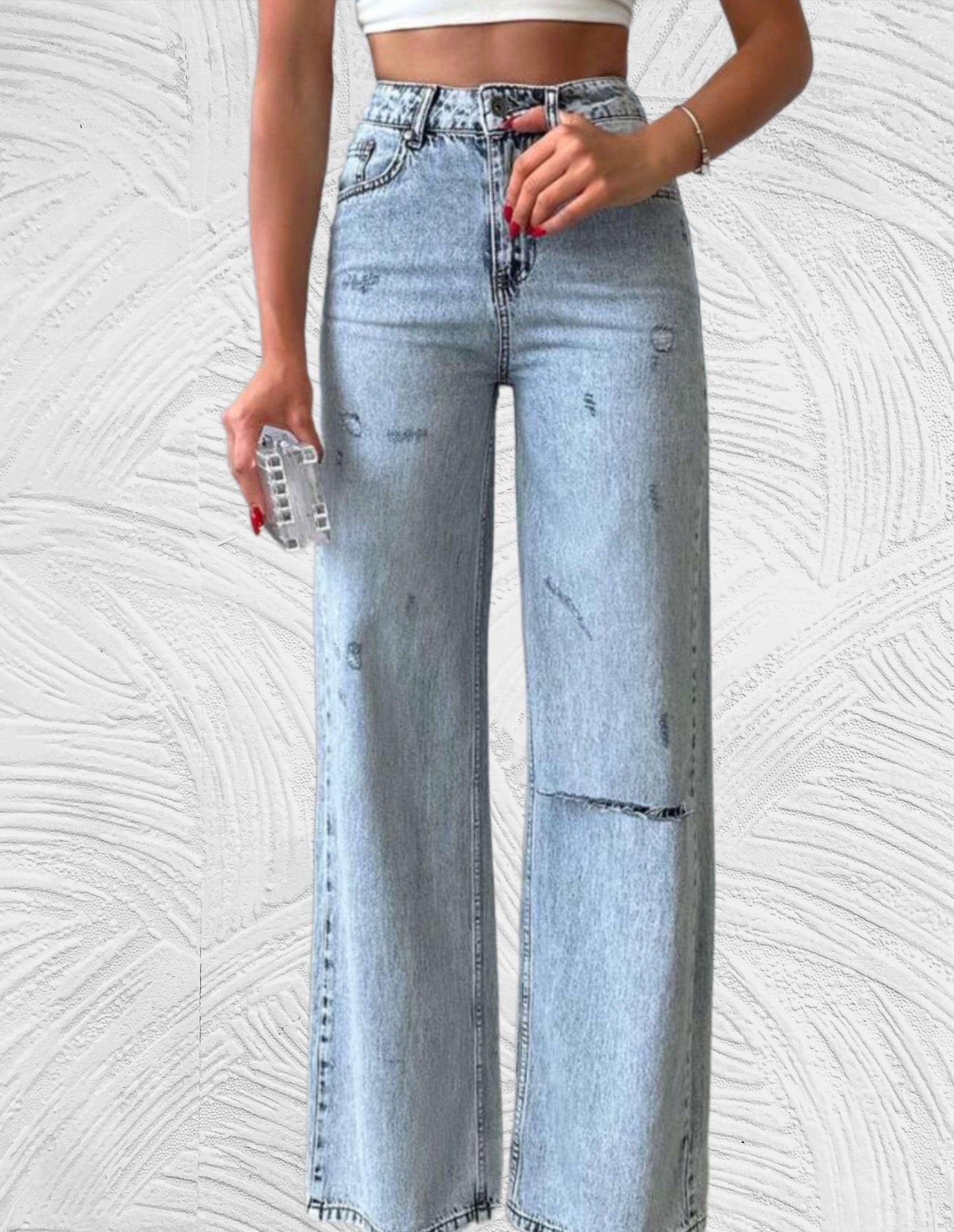 Losse jeans met hoge taille en gescheurd ontwerp