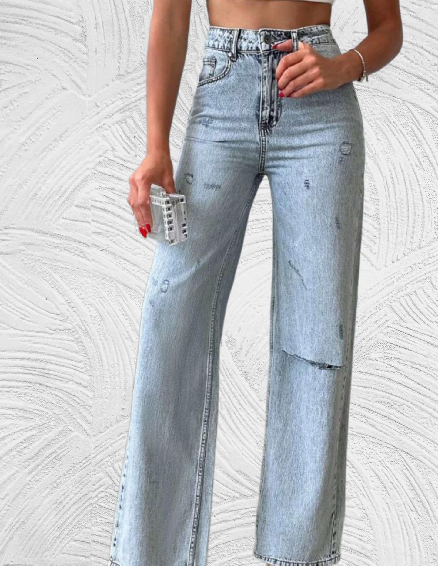 Losse jeans met hoge taille en gescheurd ontwerp