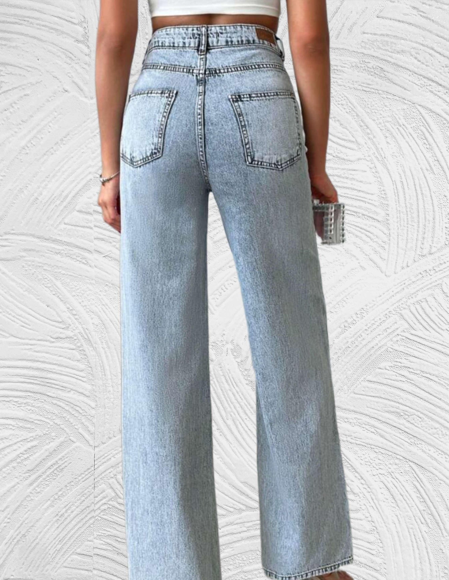 Losse jeans met hoge taille en gescheurd ontwerp