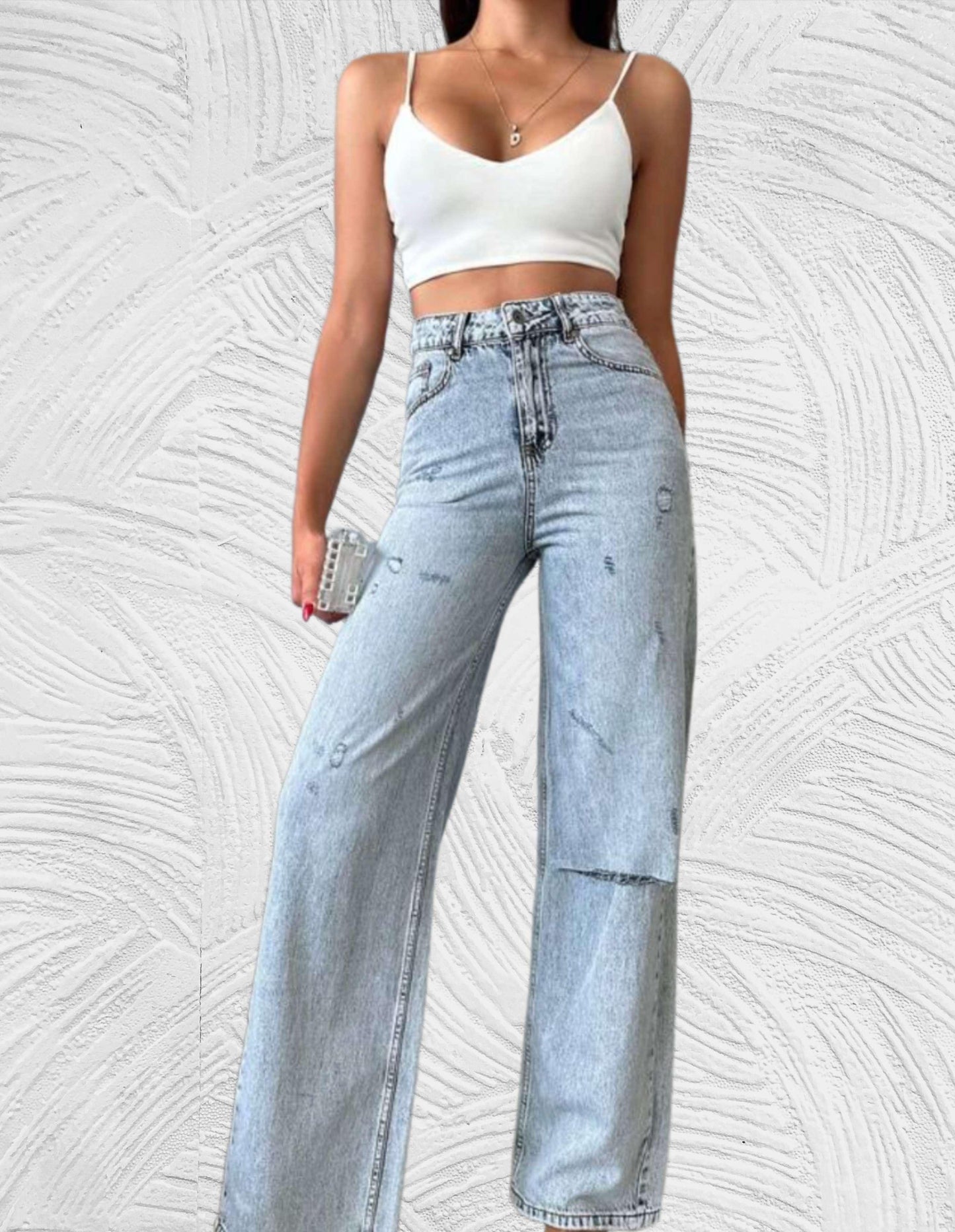 Losse jeans met hoge taille en gescheurd ontwerp