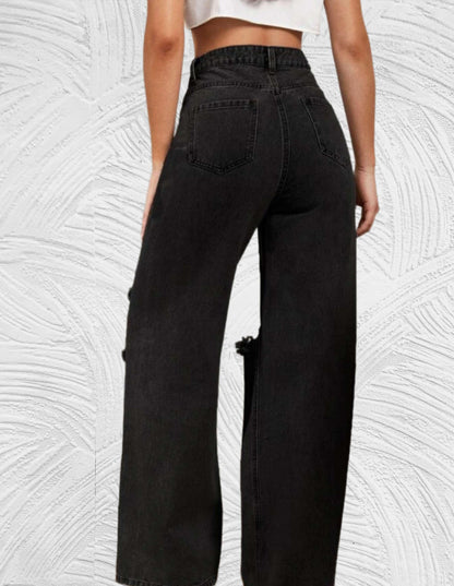 Losse jeans met hoge taille en gescheurd ontwerp
