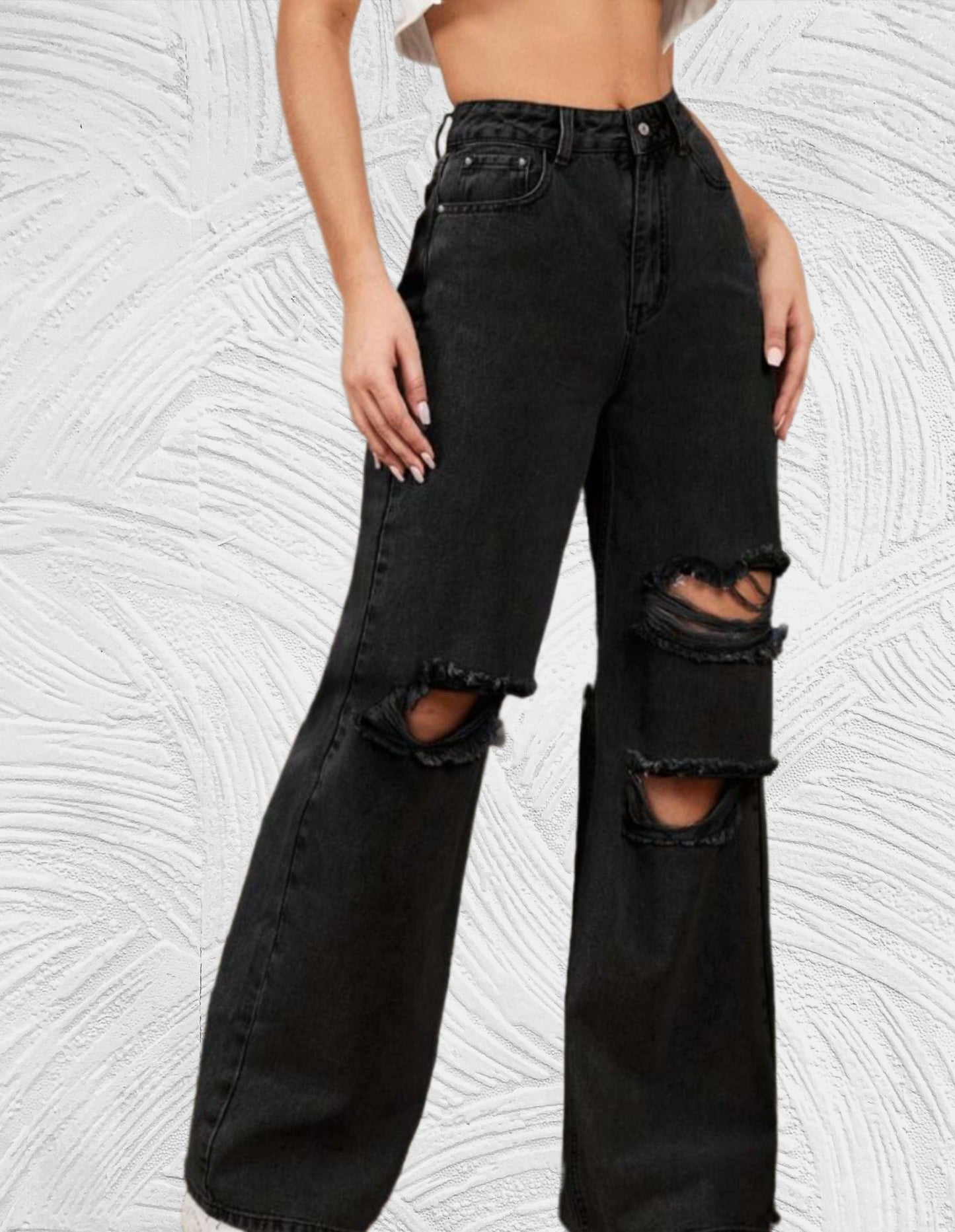 Losse jeans met hoge taille en gescheurd ontwerp