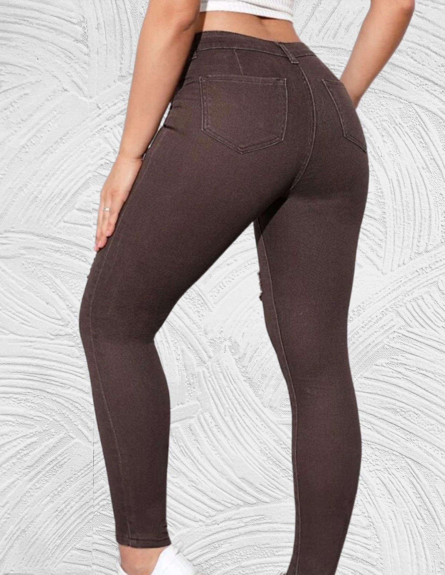 Strakke jeans met hoge taille en gescheurd ontwerp