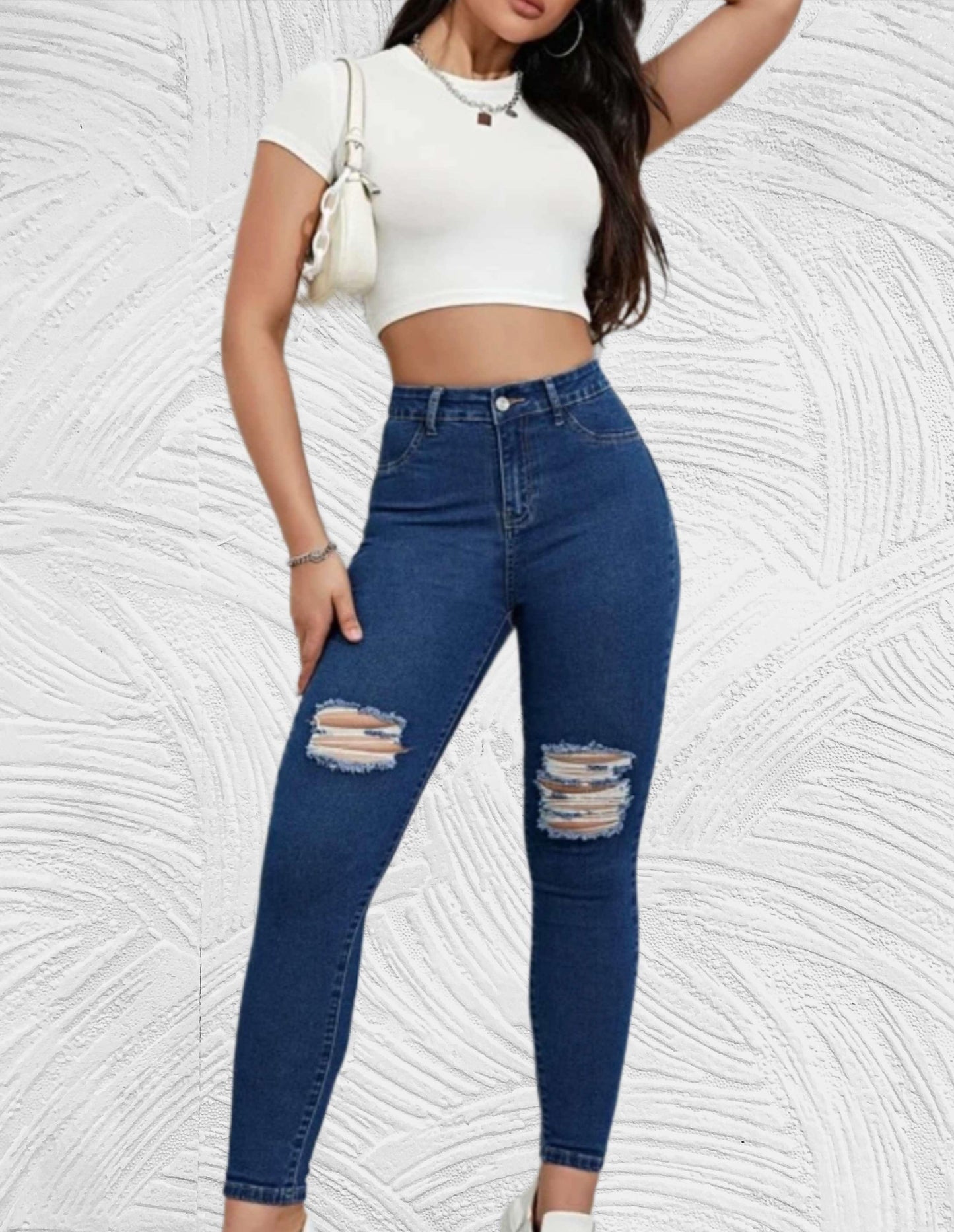 Strakke jeans met hoge taille en gescheurd ontwerp