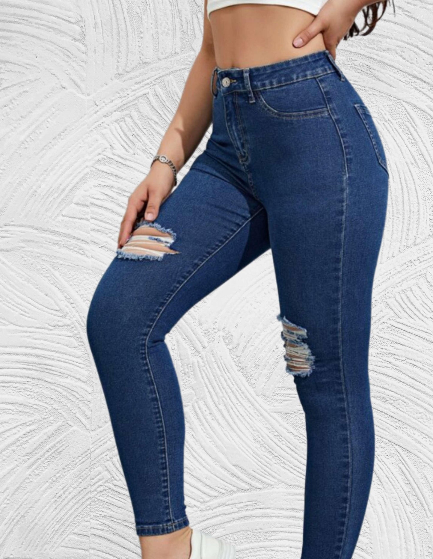 Strakke jeans met hoge taille en gescheurd ontwerp