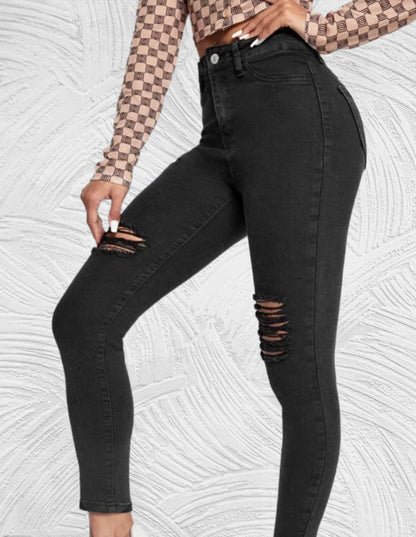 Strakke jeans met hoge taille en gescheurd ontwerp