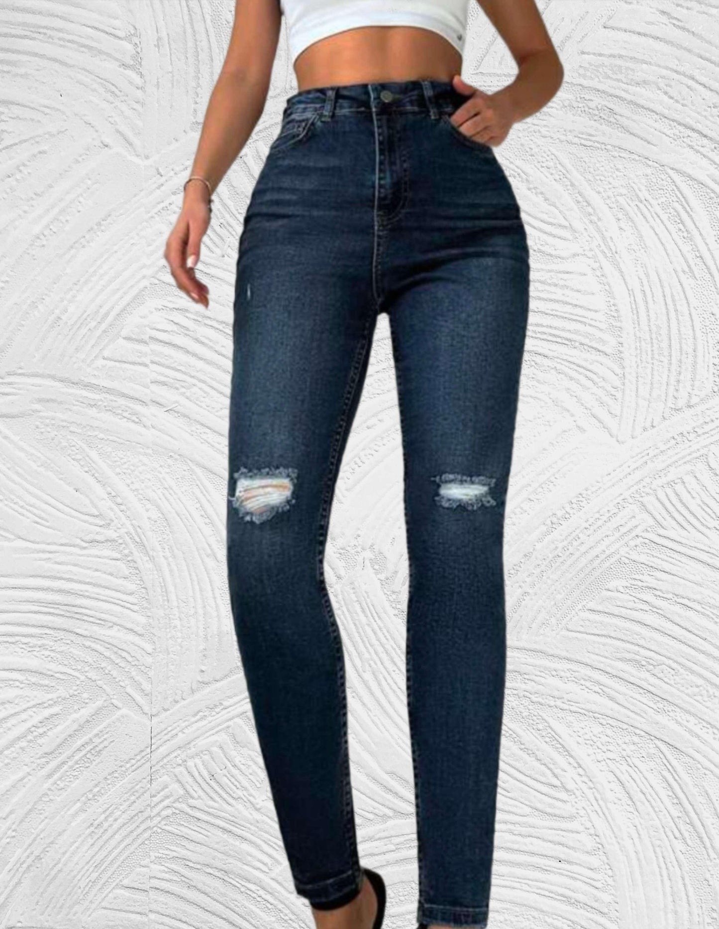 Strakke jeans met hoge taille en gescheurd ontwerp